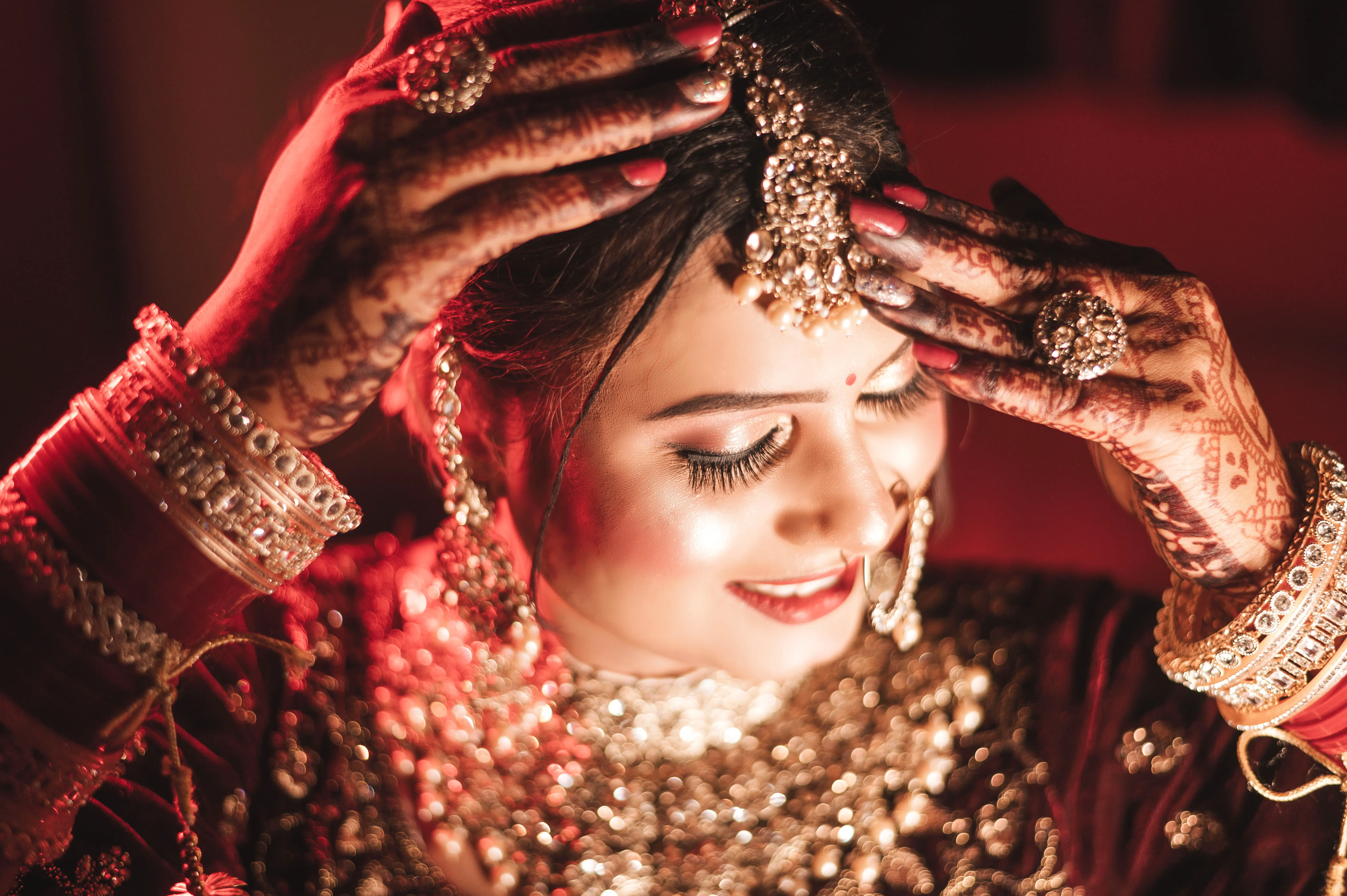 Romantic couple exchanging rings during their engagement, captured by DesignInfo Photography